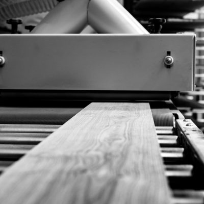 picture of a wooden floor plank during manufacturing process